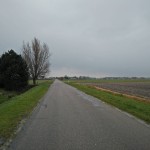 Het uitzicht vanaf de Schelpweg is ook erg fraai. Landbouwgebieden en op de achtergrond een aantal molens.